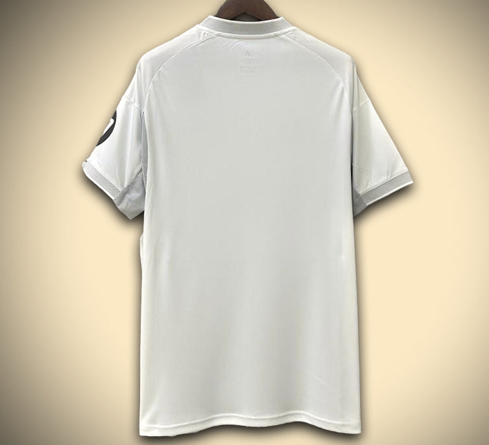 MAILLOTREALMADRID2425DOMICILEDOS.jpg Camisola Real Madrid Principal 2025-2026 vista traseira