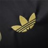 maillot-concept-real-madrid-motif-dragon-dore-edition-2425 Camisola conceito Real Madrid padrão dragão dourado edição 2425
