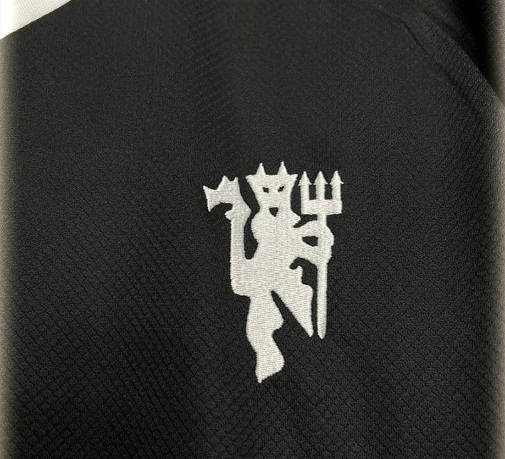 tenue-de-gardien-de-but-manchester-united-noir-manches-longues Equipamento de guarda-redes Manchester United preto mangas compridas