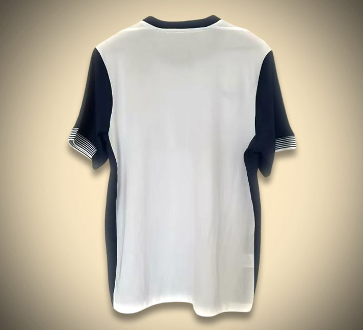 Maillottottenhamdomiciledos.jpg Camisola Tottenham Principal 2025-2026 vista de perfil