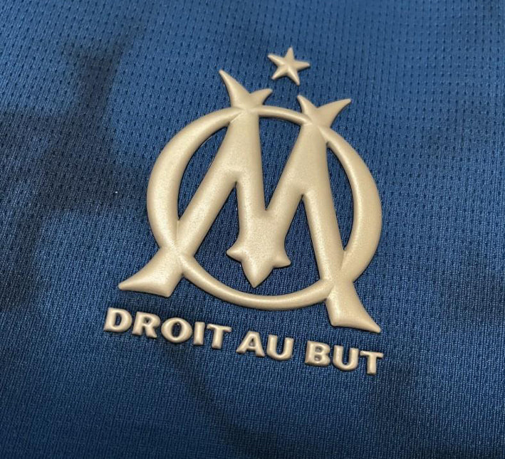 maillotmarseilleexterieurlogo.jpg Camisola Olympique Marseille Alternativa 2024-2025 vista de perfil