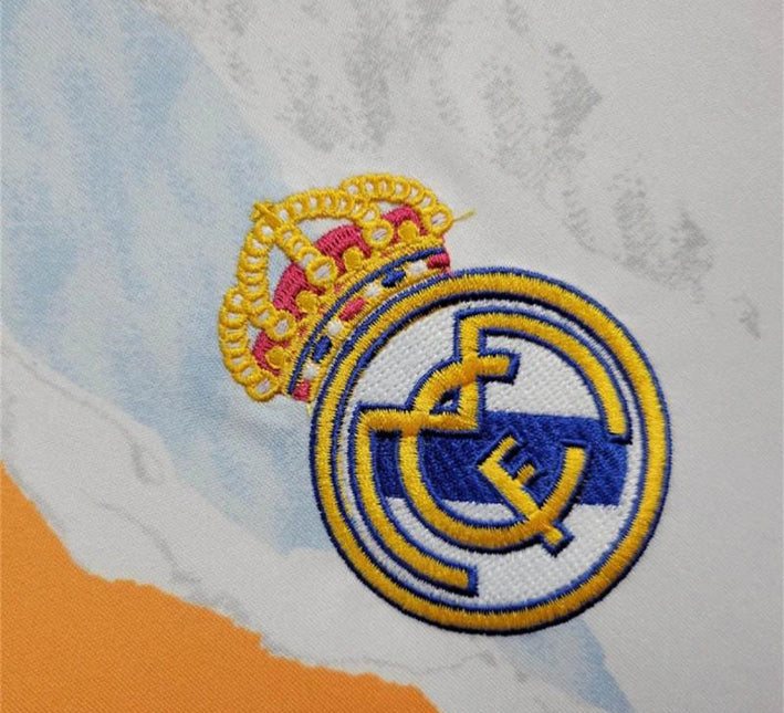 maillotrealmadridentrainementlogo.jpg Camisola Real Madrid Pré-Jogo 2024-2025 detalhe do tecido