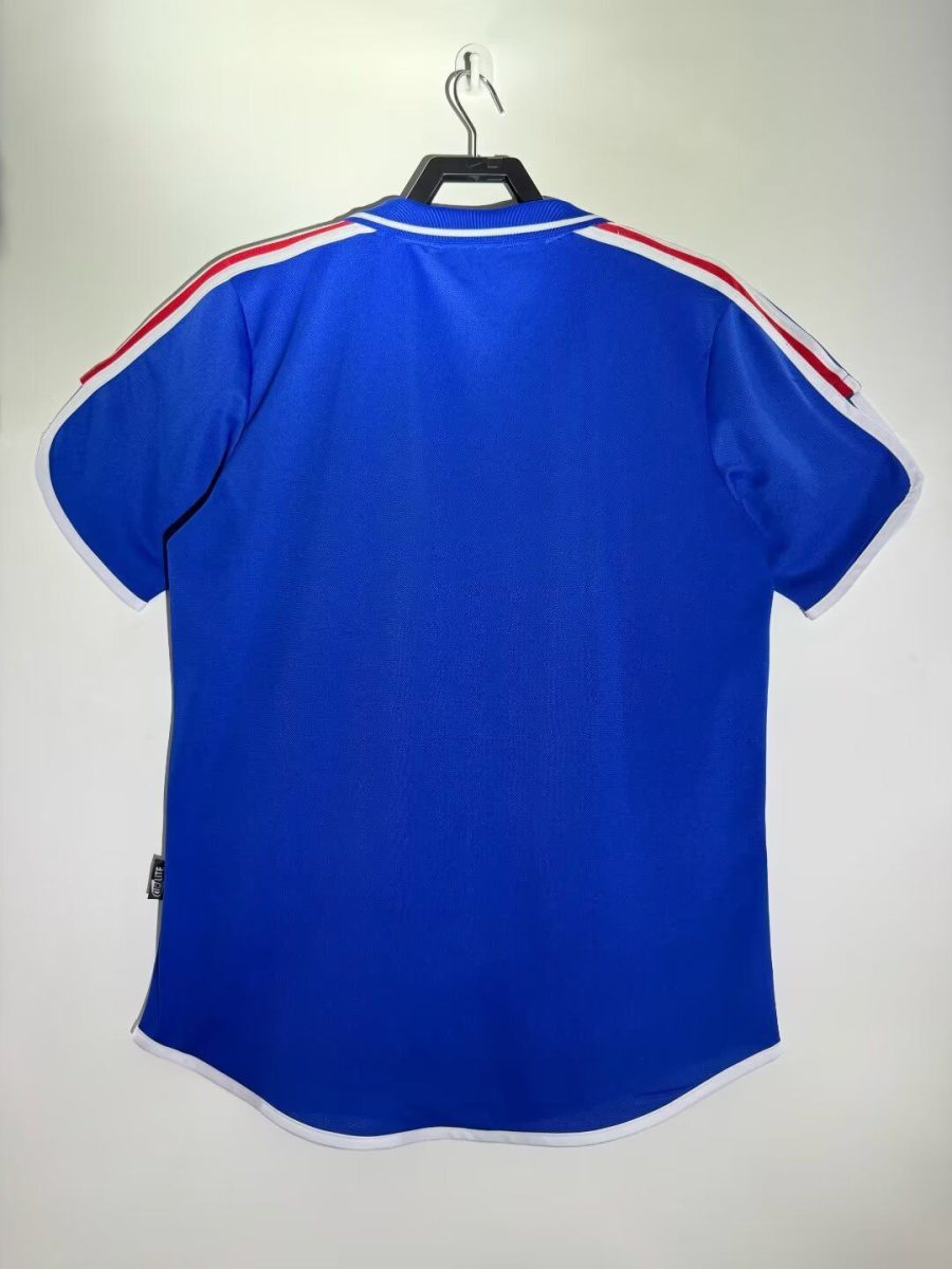 camisola de futebol equipa de França principal época dois mil colarinho tricolor