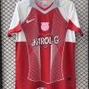 maillot-fc-barcelona-x-karol-g-rouge CAMISOLA FC BARCELONA x KAROL G VERMELHA