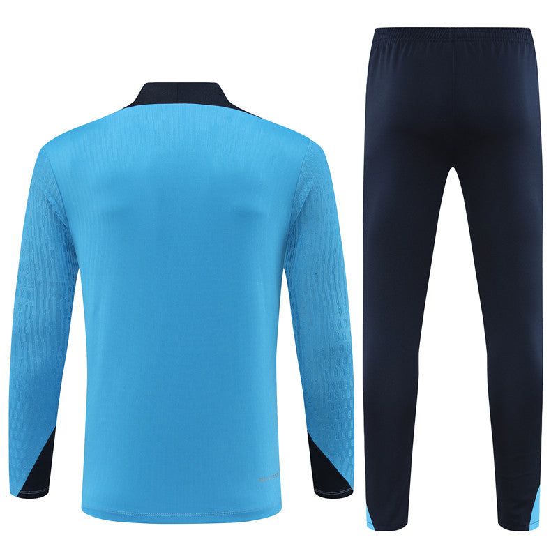 survetement-chelsea-fc-haut-et-bas-saison-2024-2025-tenue-officielle fato de treino Chelsea FC top e calças época 2024 2025 equipamento oficial