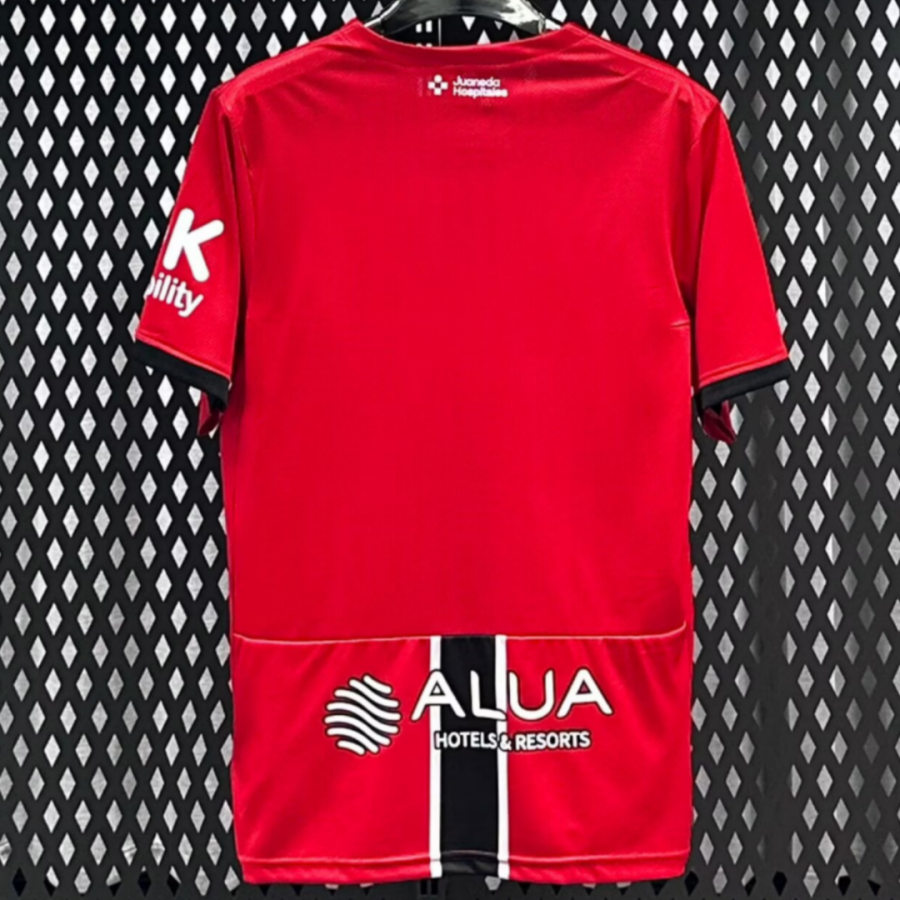 015c1bb37df6e09167bd105a1686d46a.png Camisola Mallorca Principal 2025/26
