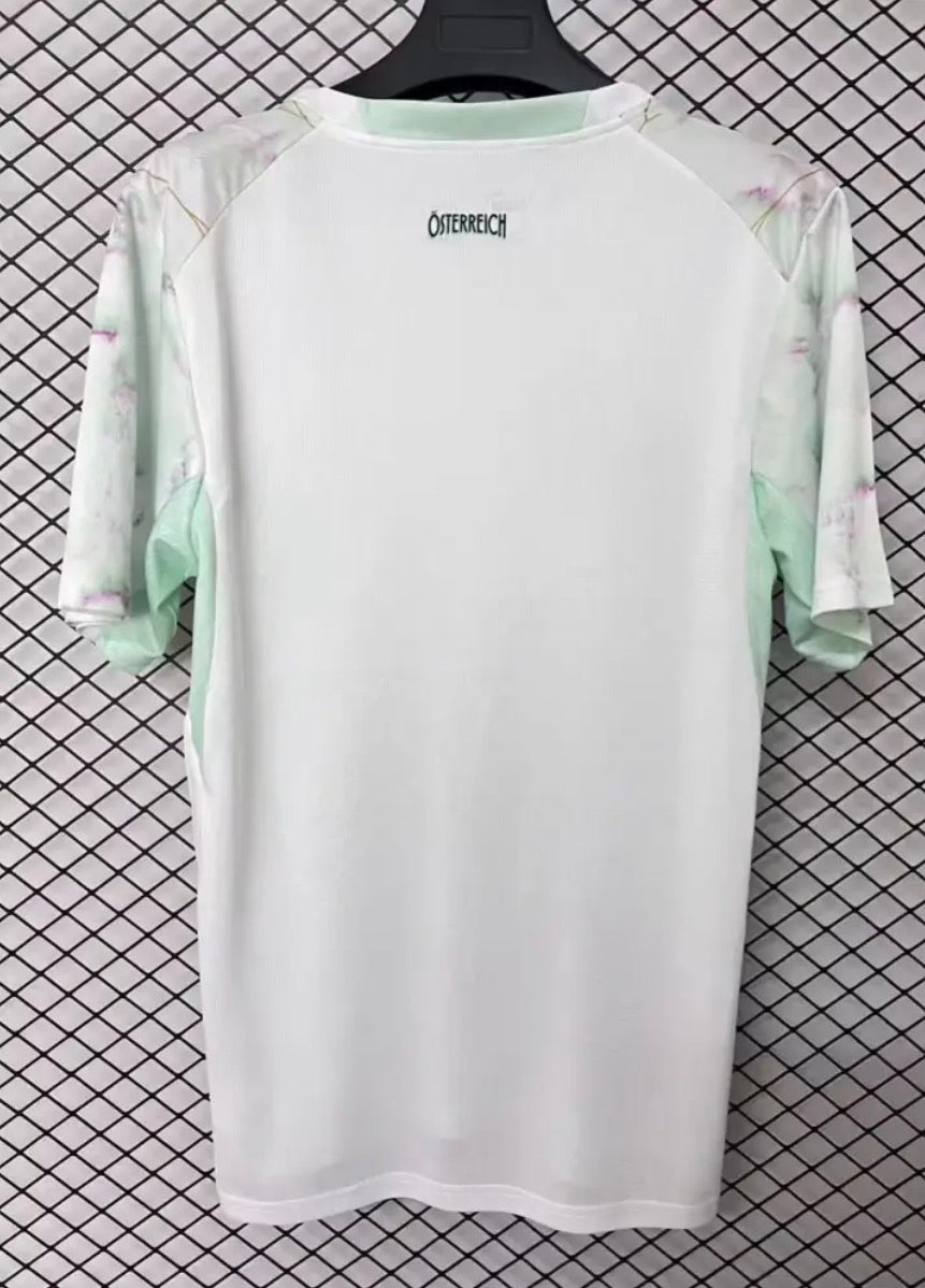 3B9B9CAC-3FF8-4D69-B80E-5FB90CBDAC7C.jpg Camisola Alternativa Áustria 2026