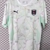 6FA63732-9562-45F7-8AC7-F4B6F357644C.jpg Camisola Áustria Alternativa 2026