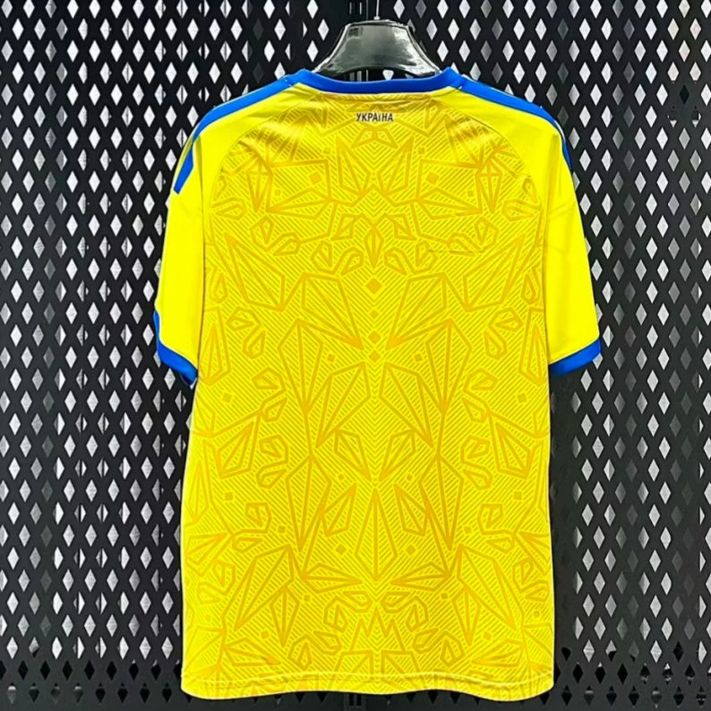 6ed1fd861da56ee17c1eae8b82568786.jpg Camisola Ucrânia Principal 2025/26