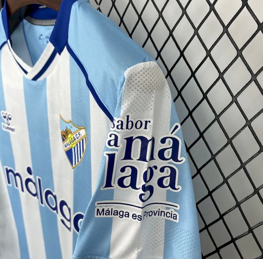 89189332-E323-42D5-8D81-CA31A9F4EC7A.jpg Camisola Málaga Principal 2025/26