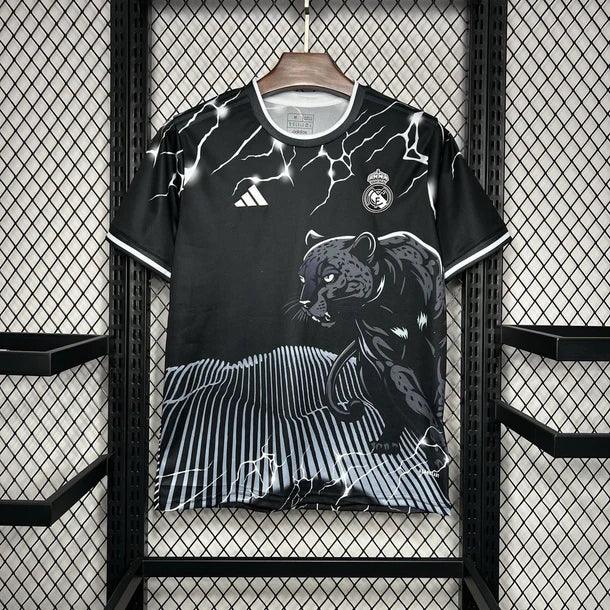 Image_184_610x_crop_center_76e55693-158e-4c6c-a3b8-574ee3898f31.jpg Camisola Real Madrid Preta & Cinza Pantera 2024/25