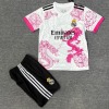 f7cd7460894322ed4daae366cd613aeb.jpg Camisola Real Madrid 25/26 Criança Rosa Dragão