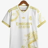 maillot-concept-real-madrid-special-edition-dragon-or-2024-2025 studio v12 Camisola Concept Real Madrid Edição Especial Dragão Dourado 2024-2025