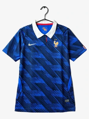 Camisola França Principal Mulher 2026